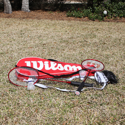 WILSON® Badminton Tour Kit- Get ready for summer fun! This badminton kit includes 4 titanium alloy badminton rackets, 3 shuttlecocks, 1 badminton net, 2 net poles, 10 hooks and a thermal bag for easy storage and travel.