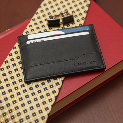 HARTMANN® Aviator Weekend Wallet - This wallet is designed with the finest leather to meet diverse and ever-changing travel or everyday needs. It features softly milled full grain Brazilian leather with aniline finish, ID window, 2 credit card pockets on the reverse side, and center slash pocket for credit cards or folded bills.